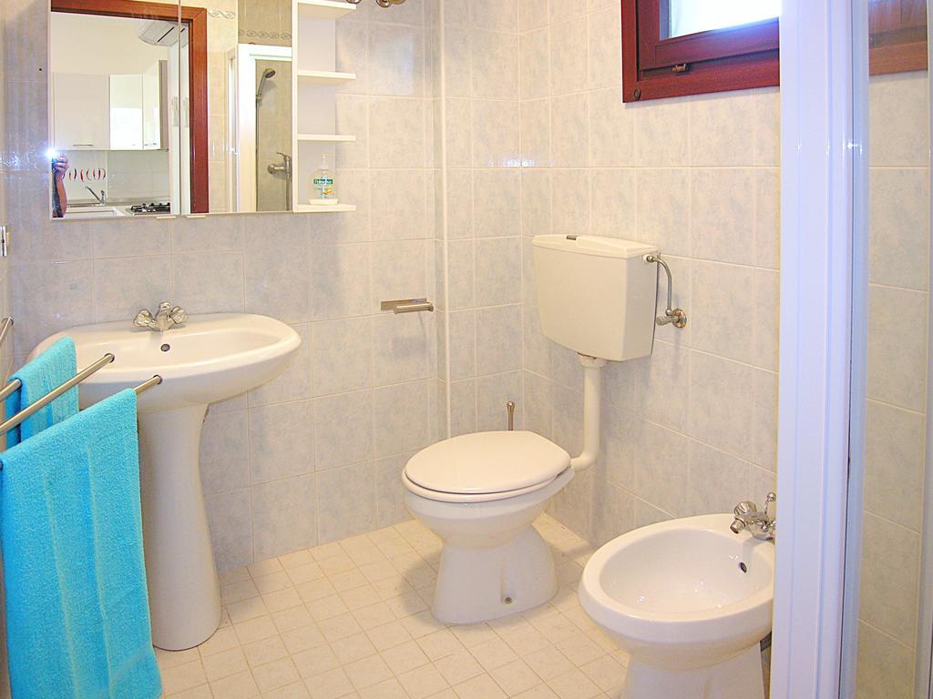 Apartment Gemini Con Piscina Бибионе Номер фото